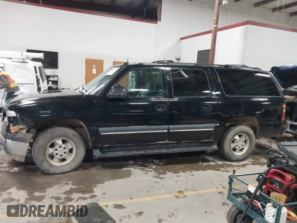 2002 Chevrolet Suburban Z71 with VIN 3GNFK16Z42G305930, listed as a IAAI auction lot 41002347 with 288,355 mi miles. Bid and sale history available at carsss.com. Image 14.
