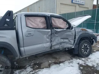 2019 Toyota Tacoma SR z VIN 3TMCZ5AN8KM211246, wystawiony jako IAAI lot #41574346 z przebiegiem 66 825 mil mil oraz . Historia ofert i sprzedaży dostępna na DreamBid. Obrazek 6.