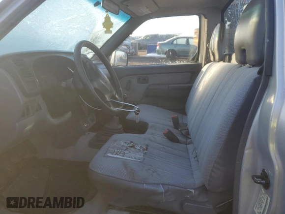 1999 Nissan Frontier XE with VIN 1N6DD21S4XC341893, listed as a Copart auction lot 42508815 with 86,040 mi miles and Salvage title. Bid and sale history available at DreamBid. Image 7.