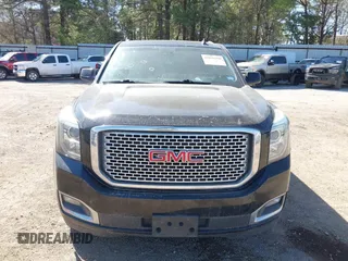 2015 GMC Yukon SLT z VIN 1GKS1BKC8FR112952, wystawiony jako IAAI lot #41836398 z przebiegiem 155 329 mil mil oraz . Historia ofert i sprzedaży dostępna na DreamBid. Obrazek 6.