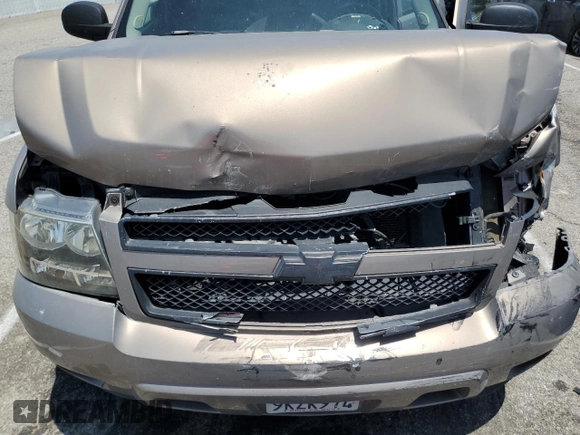 2007 Chevrolet Tahoe LS with VIN 1GNFC13J47R151058, listed as a Copart auction lot 60741285 with 210,749 mi miles and Salvage title. Bid and sale history available at DreamBid. Image 12.