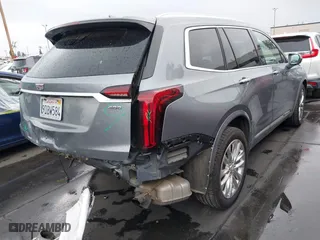 2020 Cadillac XT6 FWD Premium Luxury with VIN 1GYKPCRSXLZ105231, listed as a IAAI auction lot 41735556 with 70,319 mi miles. Bid and sale history available at carsss.com. Image 4.