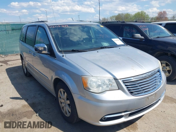 2011 Chrysler Town & Country Touring L with VIN 2A4RR8DG8BR797653, listed as a IAAI auction lot 42115304 with 185,613 mi miles and . Bid and sale history available at DreamBid. Image 1.