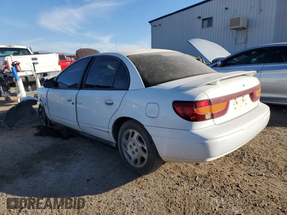 2001 Saturn SL z VIN 1G8ZK54771Z331414, wystawiony jako Copart lot #83895804 z przebiegiem 129 790 mil mil oraz Szkody całkowita. Historia ofert i sprzedaży dostępna na DreamBid. Obrazek 2.