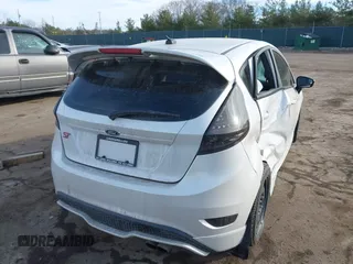 2016 Ford Fiesta ST with VIN 3FADP4GX9GM162598, listed as a IAAI auction lot 41446238 with 71,686 mi miles. Bid and sale history available at carsss.com. Image 4.