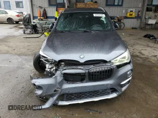 2016 BMW X1 xDrive28i with VIN WBXHT3C31G5E55041, listed as a Copart auction lot 48928705 with 104,799 mi miles and Salvage Title. Bid and sale history available at carsss.com. Image 5.