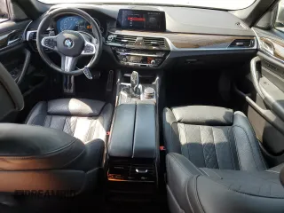 2019 BMW 5 Series M550i xDrive with VIN WBAJB9C51KB464722, listed as a Copart auction lot 53575135 with 70,187 mi miles and Salvage title. Bid and sale history available at DreamBid. Image 8.
