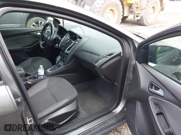 2012 Ford Focus SE with VIN 1FAHP3F29CL310052, listed as a IAAI auction lot 42671578 with 220,537 mi miles and . Bid and sale history available at DreamBid. Image 5.