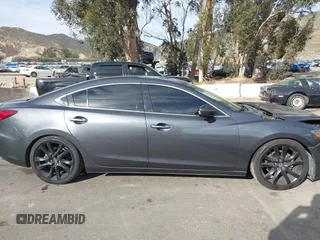 2016 Mazda Mazda6 i Grand Touring with VIN JM1GJ1W57G1441102, listed as a IAAI auction lot 41687057 with 144,876 mi miles. Bid and sale history available at carsss.com. Image 13.