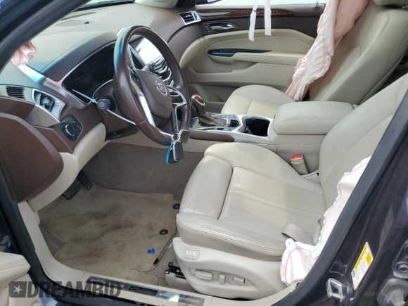 2016 Cadillac SRX Luxury Collection z VIN 3GYFNBE3XGS538339, wystawiony jako Copart lot #59485375 z przebiegiem 125 765 mil mil oraz Czysty tytuł • Clean title. Historia ofert i sprzedaży dostępna na DreamBid. Obrazek 7.