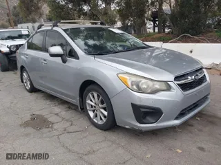2012 Subaru Impreza Sedan 2.0i Premium with VIN JF1GJAC68CH026374, listed as a IAAI auction lot 42063409 with 160,167 mi miles. Bid and sale history available at carsss.com. Image 1.