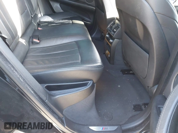 2018 BMW X6 sDrive35i with VIN 5UXKU0C5XJ0G80724, listed as a IAAI auction lot 41274338 with 122,696 mi miles. Bid and sale history available at carsss.com. Image 8.