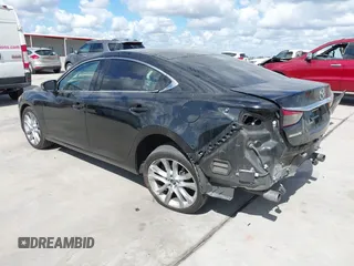 2016 Mazda Mazda6 i Touring with VIN JM1GJ1V53G1430339, listed as a IAAI auction lot 40696335 with 88,433 mi miles. Bid and sale history available at carsss.com. Image 3.