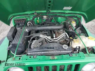 2005 Jeep Wrangler Sport with VIN 1J4FA49S95P315455, listed as a Copart auction lot 73159804 with 108,419 mi miles and Salvage Title. Bid and sale history available at carsss.com. Image 11.