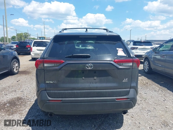 2019 Toyota RAV4 LE with VIN JTMG1RFV9KD014526, listed as a IAAI auction lot 42638858 with 90,995 mi miles and . Bid and sale history available at DreamBid. Image 17.