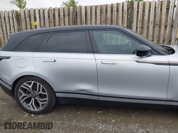 2018 Land Rover Range Rover Velar R-Dynamic HSE z VIN SALYM2RV0JA742422, wystawiony jako IAAI lot #42168647 z przebiegiem 65 298 mil mil oraz . Historia ofert i sprzedaży dostępna na DreamBid. Obrazek 13.