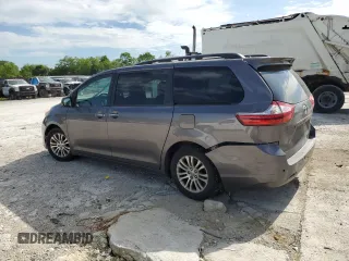 2015 Toyota Sienna XLE with VIN 5TDYK3DC5FS643985, listed as a Copart auction lot 56956505 with 179,131 mi miles and Salvage title. Bid and sale history available at DreamBid. Image 2.