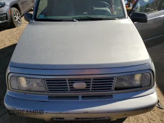 1995 Chevrolet Tracker z VIN 2CNBJ186XS6926688, wystawiony jako Copart lot #77487204 z przebiegiem 17 598 mil mil oraz Szkoda całkowita • Salvage title. Historia ofert i sprzedaży dostępna na DreamBid. Obrazek 11.