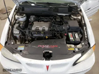 2001 Pontiac Grand Am GT1 with VIN 1G2NV52EX1C228458, listed as a Copart auction lot 76138094 with 118,833 mi miles and Clean Title. Bid and sale history available at carsss.com. Image 11.