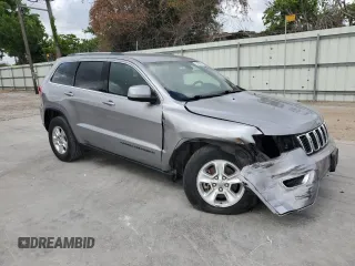 2017 Jeep Grand Cherokee Laredo with VIN 1C4RJEAG0HC664063, listed as a Copart auction lot 54850295 with 82,913 mi miles and Salvage title. Bid and sale history available at DreamBid. Image 4.