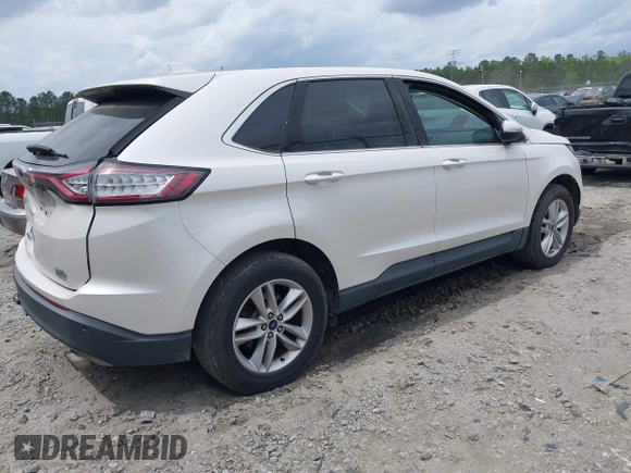 2015 Ford Edge SEL with VIN 2FMTK3J99FBC37403, listed as a IAAI auction lot 41970971 with 136,097 mi miles. Bid and sale history available at carsss.com. Image 4.