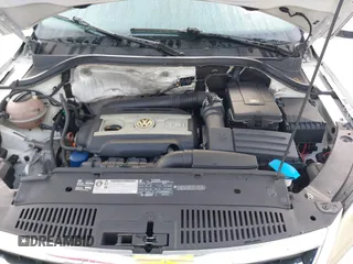 2010 Volkswagen Tiguan SEL with VIN WVGBV7AX6AW521541, listed as a IAAI auction lot 41936952 with 124,499 mi miles and . Bid and sale history available at DreamBid. Image 10.
