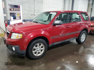 2011 Mazda Tribute Touring with VIN 4F2CY0C71BKM06780, listed as a Copart auction lot 77748114 with 144,163 mi miles and Salvage Title. Bid and sale history available at carsss.com. Image 1.