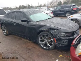 2015 Dodge Charger SXT with VIN 2C3CDXHG3FH754224, listed as a IAAI auction lot 41527488 with 162,116 mi miles. Bid and sale history available at carsss.com. Image 1.