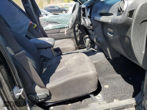2014 Jeep Wrangler Unlimited Sport with VIN 1C4BJWDG7EL257811, listed as a Copart auction lot 50112335 with 218,530 mi miles and Salvage Title. Bid and sale history available at carsss.com. Image 7.