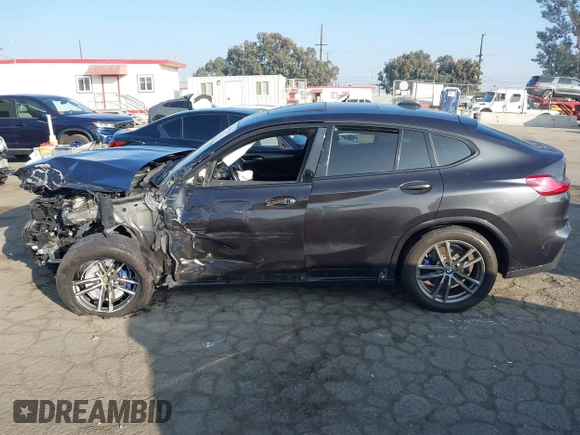 2019 BMW X4 M40i z VIN 5UXUJ5C54KLJ64077, wystawiony jako IAAI lot #41012233 z przebiegiem 40 737 mil mil oraz . Historia ofert i sprzedaży dostępna na DreamBid. Obrazek 13.
