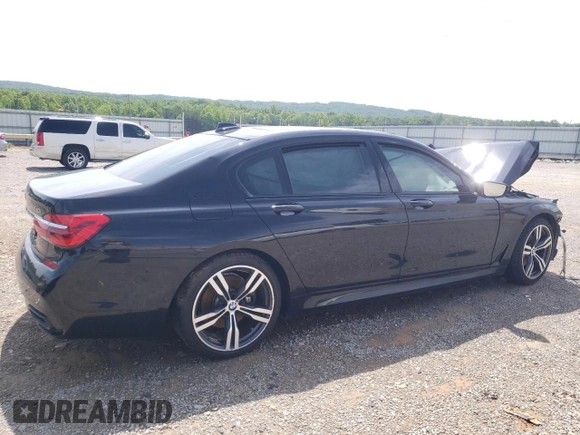2016 BMW 7 Series 740i with VIN WBA7E2C59GG738509, listed as a Copart auction lot 52097993 with 0 mi miles. Bid and sale history available at carsss.com. Image 3.
