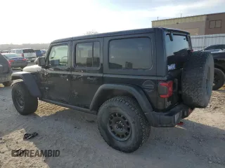 2021 Jeep Wrangler Unlimited Rubicon with VIN 1C4HJXFN6MW559471, listed as a Copart auction lot 48459855 with 33,495 mi miles and Salvage title. Bid and sale history available at DreamBid. Image 2.