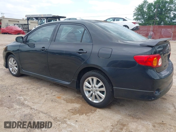 2009 Toyota Corolla with VIN 1NXBU40E19Z135389, listed as a IAAI auction lot 42188550 with 215,054 mi miles. Bid and sale history available at carsss.com. Image 3.
