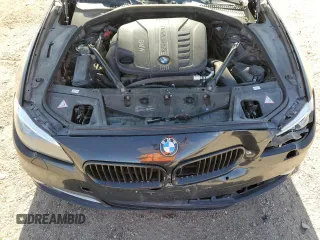 2014 BMW 5 Series 535d with VIN WBAXA5C51ED690385, listed as a Copart auction lot 57290645 with 161,694 mi miles and Salvage title. Bid and sale history available at DreamBid. Image 11.