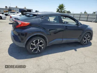 2018 Toyota C-HR XLE with VIN NMTKHMBXXJR044779, listed as a Copart auction lot 59895875 with 135,761 mi miles and Clean title. Bid and sale history available at DreamBid. Image 3.