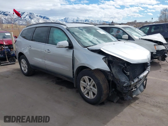 2013 Chevrolet Traverse LT with VIN 1GNKVGKD6DJ240146, listed as a IAAI auction lot 41665024 with 118,648 mi miles and . Bid and sale history available at DreamBid. Image 1.