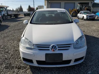 2009 Volkswagen Rabbit S with VIN WVWDB71K89W040860, listed as a Copart auction lot 73996744 with 118,450 mi miles and Salvage Title. Bid and sale history available at carsss.com. Image 5.