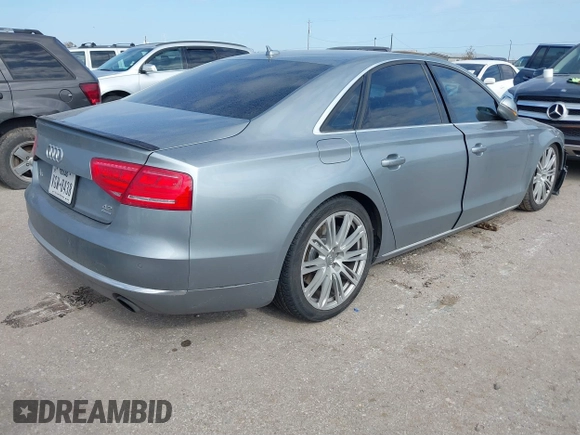 2011 Audi A8 with VIN WAUAVAFD5BN021080, listed as a IAAI auction lot 41223418 with 80,538 mi miles and . Bid and sale history available at DreamBid. Image 4.