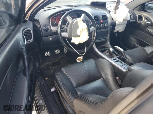 2005 Pontiac GTO with VIN 6G2VX12U75L457697, listed as a Copart auction lot 84683564 with 57,504 mi miles and Salvage Title. Bid and sale history available at carsss.com. Image 8.
