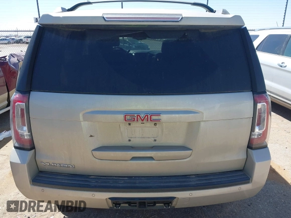 2015 GMC Yukon SLT with VIN 1GKS1BKC1FR145694, listed as a IAAI auction lot 41851644 with 162,592 mi miles. Bid and sale history available at carsss.com. Image 16.