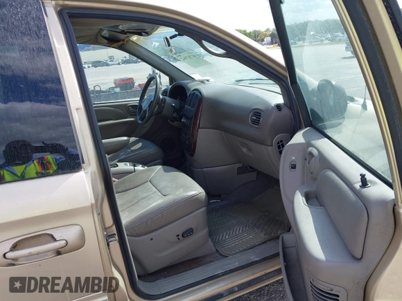 2001 Chrysler Town & Country LXi with VIN 2C8GP54L71R146624, listed as a IAAI auction lot 41767162 with 78,458 mi miles and . Bid and sale history available at DreamBid. Image 5.