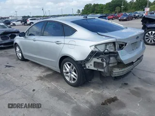 2015 Ford Fusion SE with VIN 3FA6P0H70FR141768, listed as a IAAI auction lot 42085851 with 134,844 mi miles. Bid and sale history available at carsss.com. Image 3.