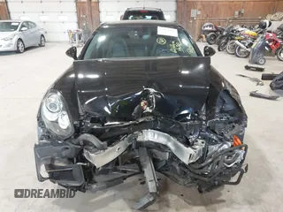 2016 Porsche Panamera S E-Hybrid z VIN WP0AD2A74GL040039, wystawiony jako IAAI lot #42411042 z przebiegiem 60 616 mil mil oraz . Historia ofert i sprzedaży dostępna na DreamBid. Obrazek 13.