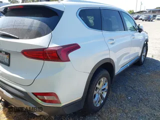 2020 Hyundai Santa Fe SE with VIN 5NMS23AD8LH285363, listed as a IAAI auction lot 42408647 with 60,058 mi miles and . Bid and sale history available at DreamBid. Image 4.