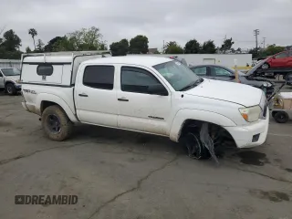 2014 Toyota Tacoma with VIN 3TMLU4EN2EM149348, listed as a Copart auction lot 53055245 with 122,642 mi miles and Salvage Title. Bid and sale history available at carsss.com. Image 4.