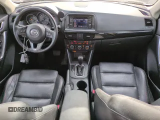 2015 Mazda CX-5 Grand Touring with VIN JM3KE4DY3F0495411, listed as a Copart auction lot 50077765 with 136,191 mi miles and Salvage Title. Bid and sale history available at DreamBid. Image 8.
