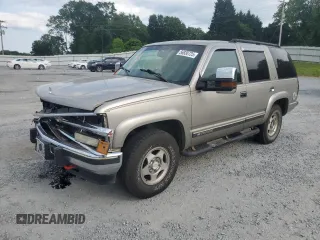 2000 Chevrolet Tahoe Z71 with VIN 1GNEK13R7YR189177, listed as a Copart auction lot 56830725 with 308,270 mi miles and Salvage title. Bid and sale history available at DreamBid. Image 1.