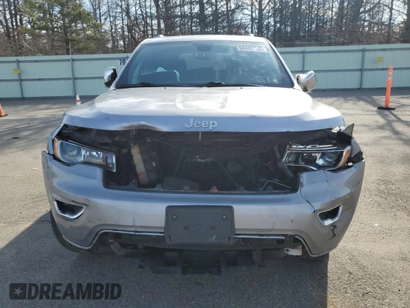 2021 Jeep Grand Cherokee 80th Anniversary with VIN 1C4RJFBG7MC665757, listed as a Copart auction lot 52443235 with 99,828 mi miles and Salvage Title. Bid and sale history available at DreamBid. Image 5.