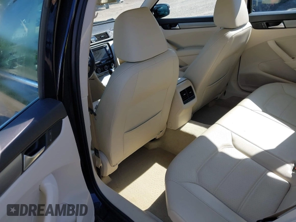 2014 Volkswagen Passat SE с VIN 1VWBN7A37EC002696, выставлен на аукционе IAAI как лот 42308028 с пробегом 165 111 миль миль и . История ставок и продаж доступна на DreamBid. Изображение 8.