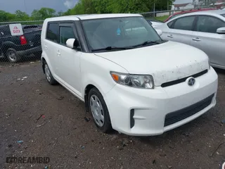 2012 Scion xB with VIN JTLZE4FE3CJ023780, listed as a IAAI auction lot 42120908 with 231,962 mi miles. Bid and sale history available at carsss.com. Image 1.